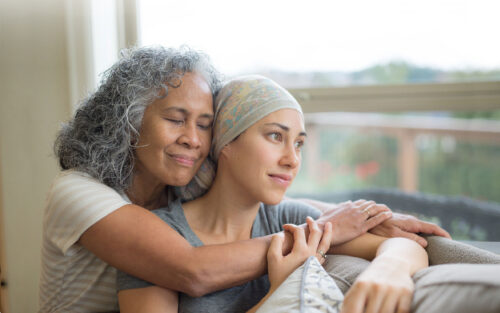 Cancer patient scarf friend family iStock 672689882 extended cropped 2