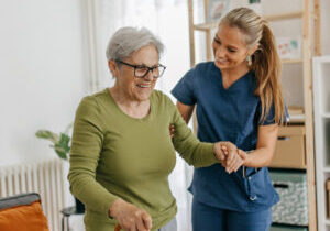 Happy Elderly Woman at Elder Care Facility