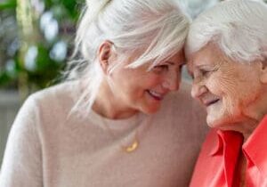 elderly mom with caregiver