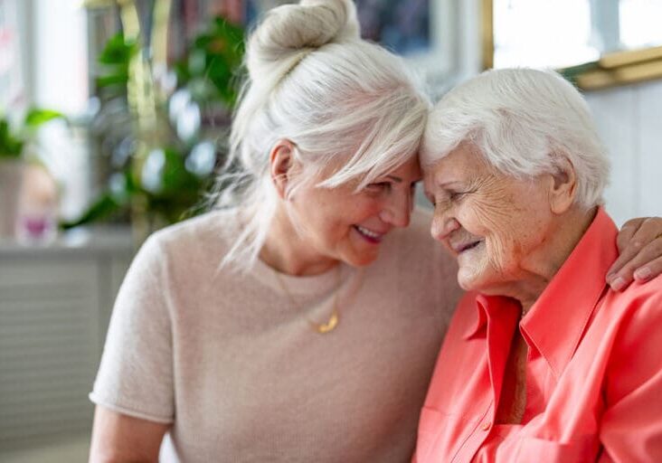 elderly mom with caregiver