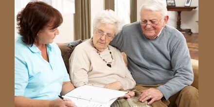 older clients discussing Medicare marketing messages and reviewing options